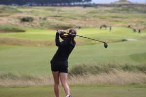 Girl golfing